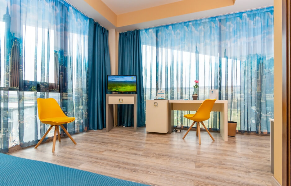 Camerele Executive: confortabile, colorate, moderne